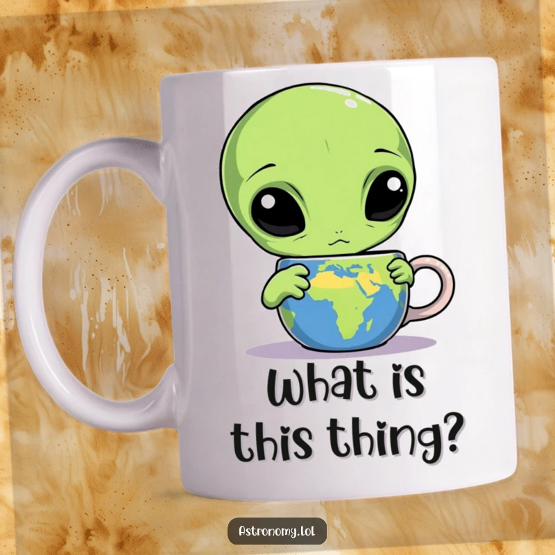Funny alien mug with three eyes, looking confused and intrigued while staring intently at a mug decorated with the Earth.