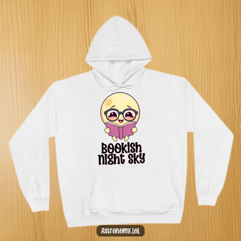 Funny hoodie: A moon wearing spectacles reads a book, offering warmth and intellectual humor.