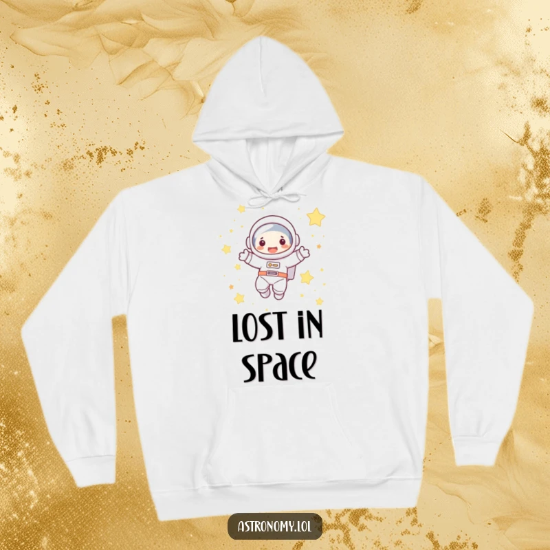 Funny astronaut hoodie showcasing a cute character joyfully floating amidst twinkling stars, perfect for warmth and a touch of humor.