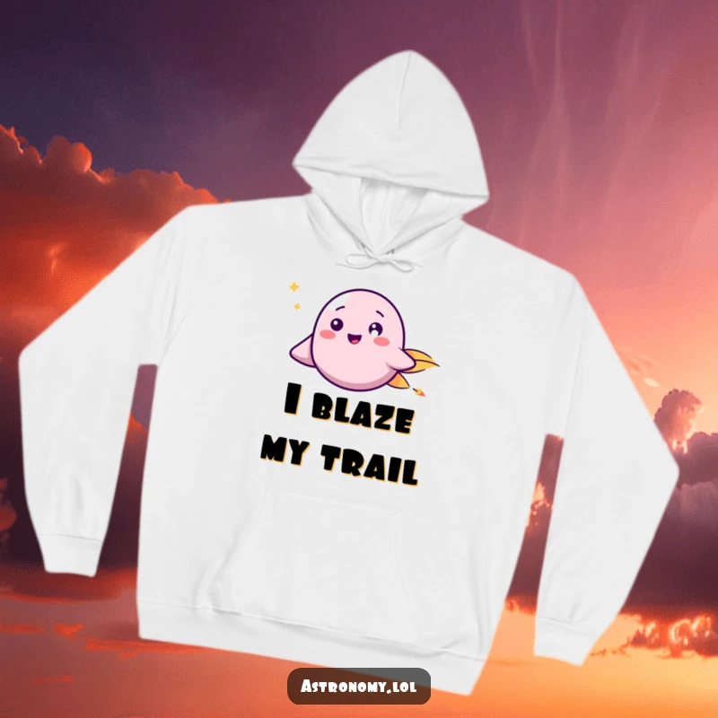 Funny Hoodie: A happy comet with a friendly face is depicted zooming through the vastness of space.