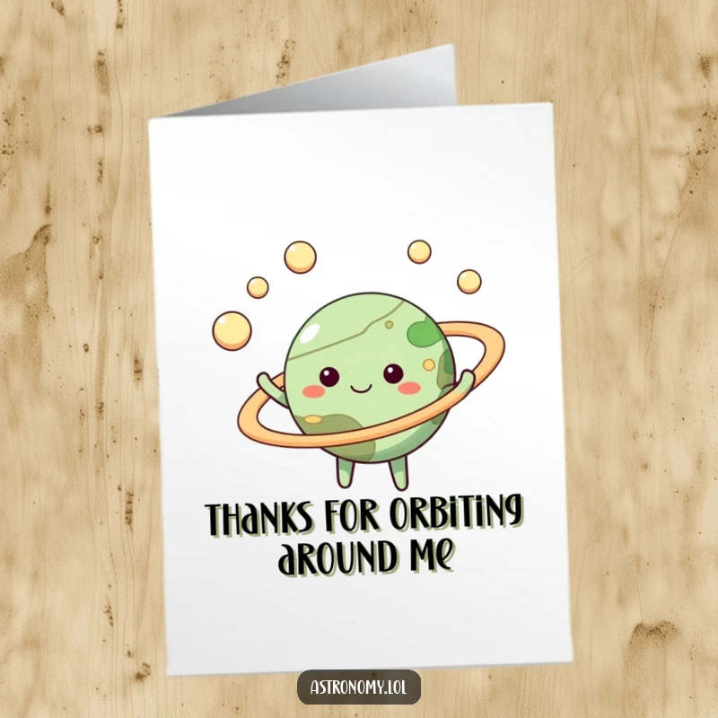 Happy Free Printable Thank You Card: Smiling planet character juggles moons, expressing heartfelt thanks.