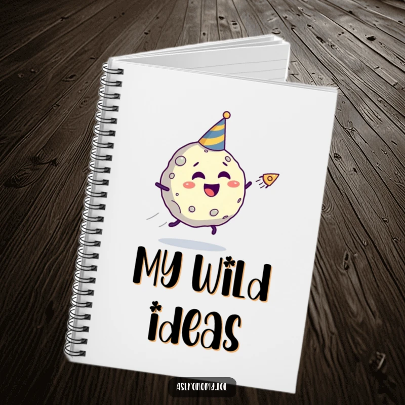 Funny asteroid notebook with a giggling character in a party hat being chased by a comet, ideal for notes with a humorous theme.