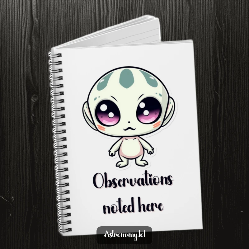 Funny notebook featuring a surprised alien with large, wide eyes, ideal for jotting down notes with a whimsical, space-themed flair.