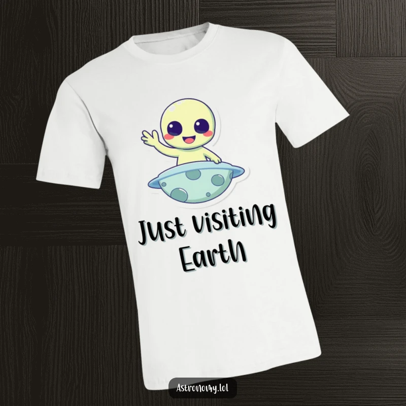 Funny T-Shirt: A cheerful alien character waving a friendly hello while standing on an alien planet.