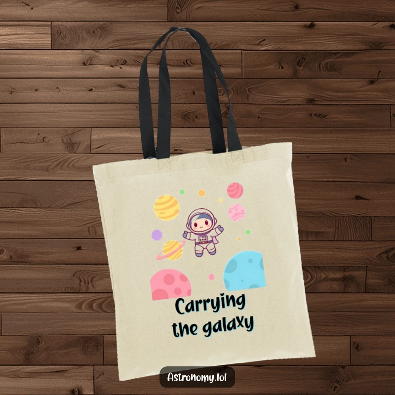 Funny astronaut tote bag depicting a cute character happily drifting through a vibrant, planet-filled galaxy.
